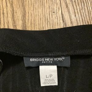 Slim lined skirt button front.